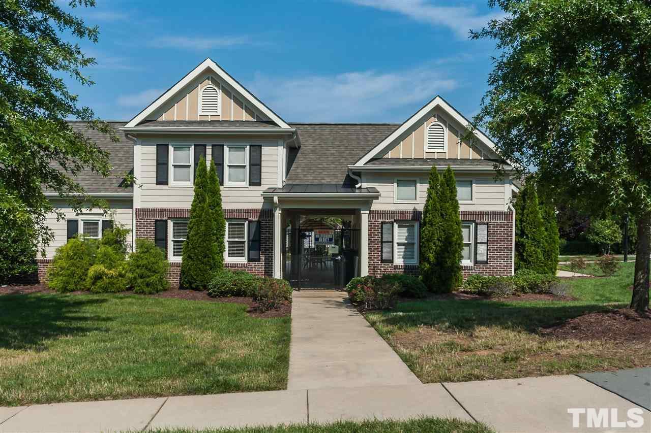 7822 Silverthread Lane Raleigh, NC 27617 - Photo 17 of 18 front view of a house with a yard