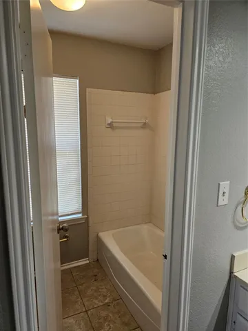 a bathroom with a tub
