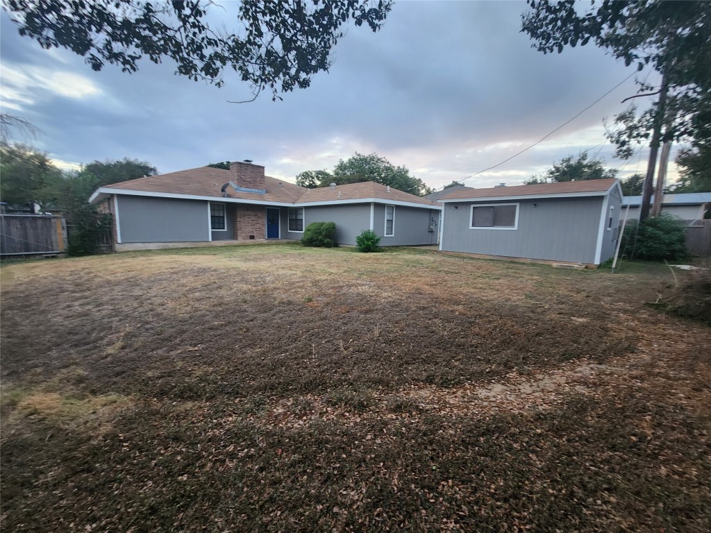 302 Burning Tree Drive Georgetown, TX 78628 - Photo 29 of 30 a front view of a house with a garden