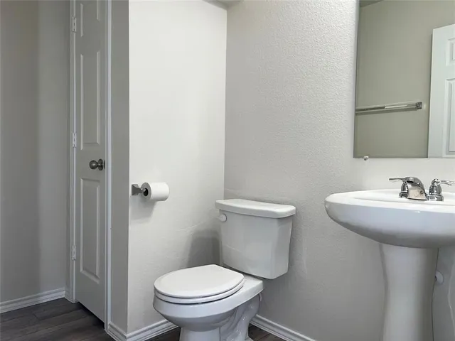 a bathroom with a sink and a toilet