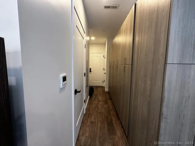 a view of hallway with stairs