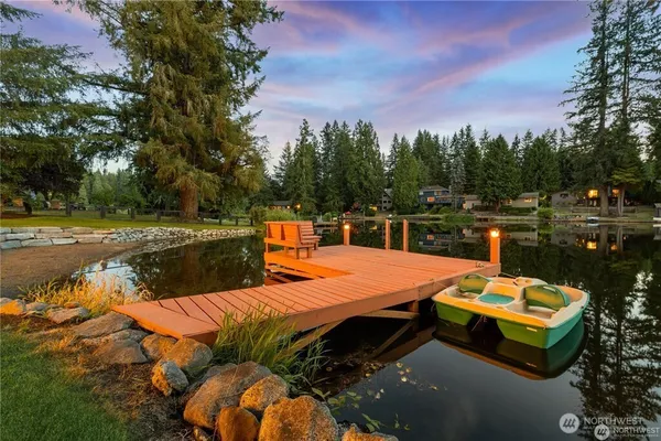 a view of a swimming pool with a lounge chairs