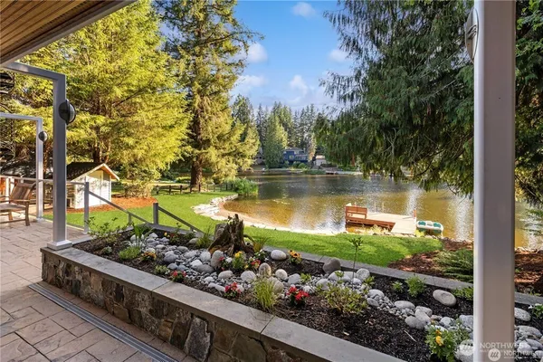 a view of a lake with a garden