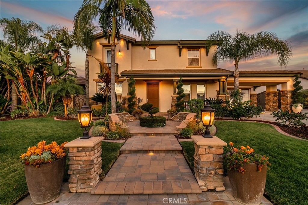 8075 Terraza Court Riverside, CA 92508 - Photo 2 of 75 front view of a house with a yard