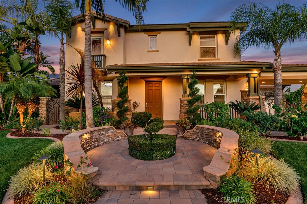 8075 Terraza Court Riverside, CA 92508 - Photo 3 of 75 front view of house with a yard and potted plants