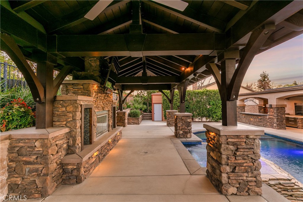 8075 Terraza Court Riverside, CA 92508 - Photo 45 of 75 a view of a porch with furniture and a yard