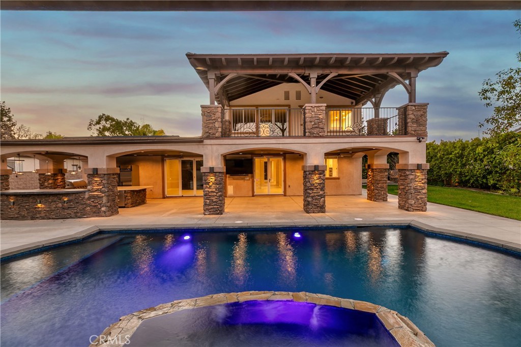 8075 Terraza Court Riverside, CA 92508 - Photo 49 of 75 a front view of a house with swimming pool