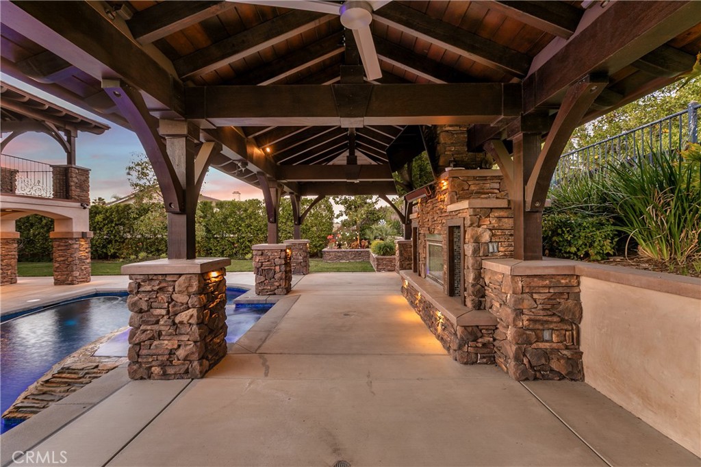8075 Terraza Court Riverside, CA 92508 - Photo 51 of 75 Inside Sitting Area with Fireplace & TV