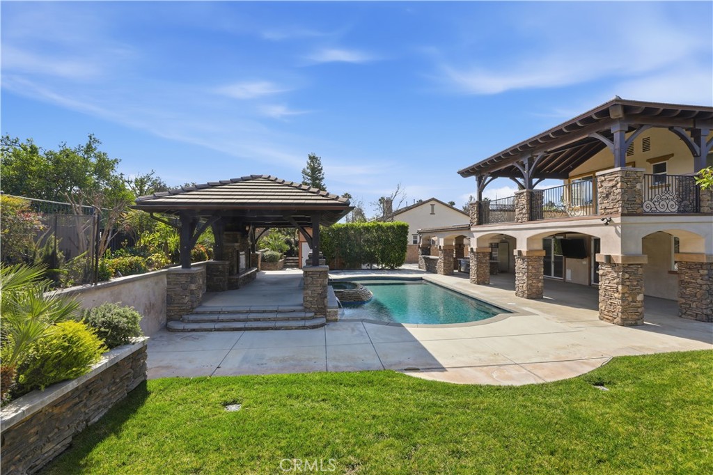 8075 Terraza Court Riverside, CA 92508 - Photo 61 of 75 a view of a house with a yard patio and furniture