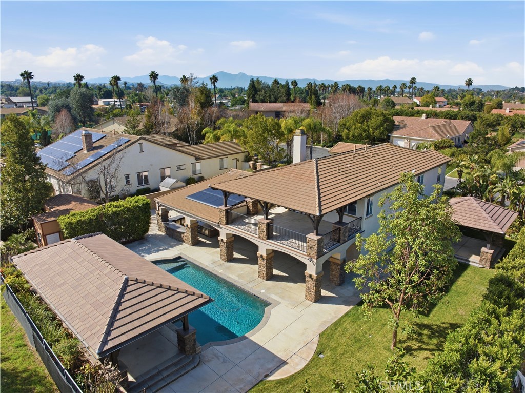 8075 Terraza Court Riverside, CA 92508 - Photo 67 of 75 an aerial view of a house with a yard patio and outdoor seating