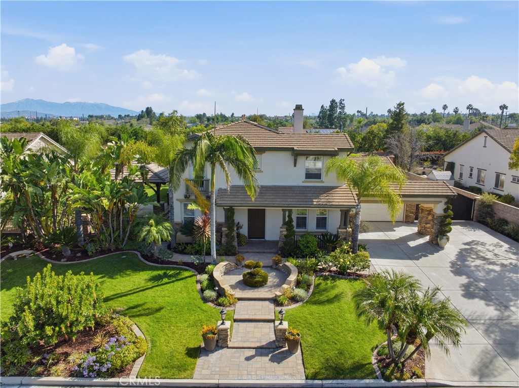 8075 Terraza Court Riverside, CA 92508 - Photo 69 of 75 a front view of a house with garden