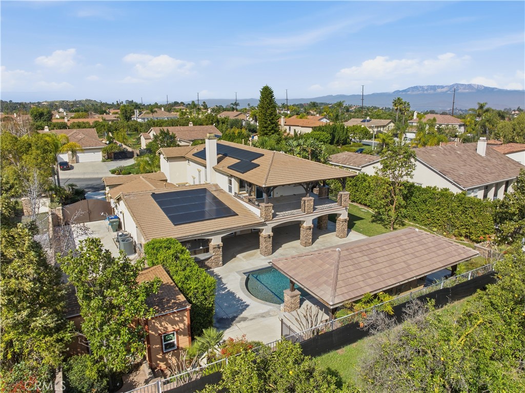 8075 Terraza Court Riverside, CA 92508 - Photo 73 of 75 an aerial view of a house with a garden
