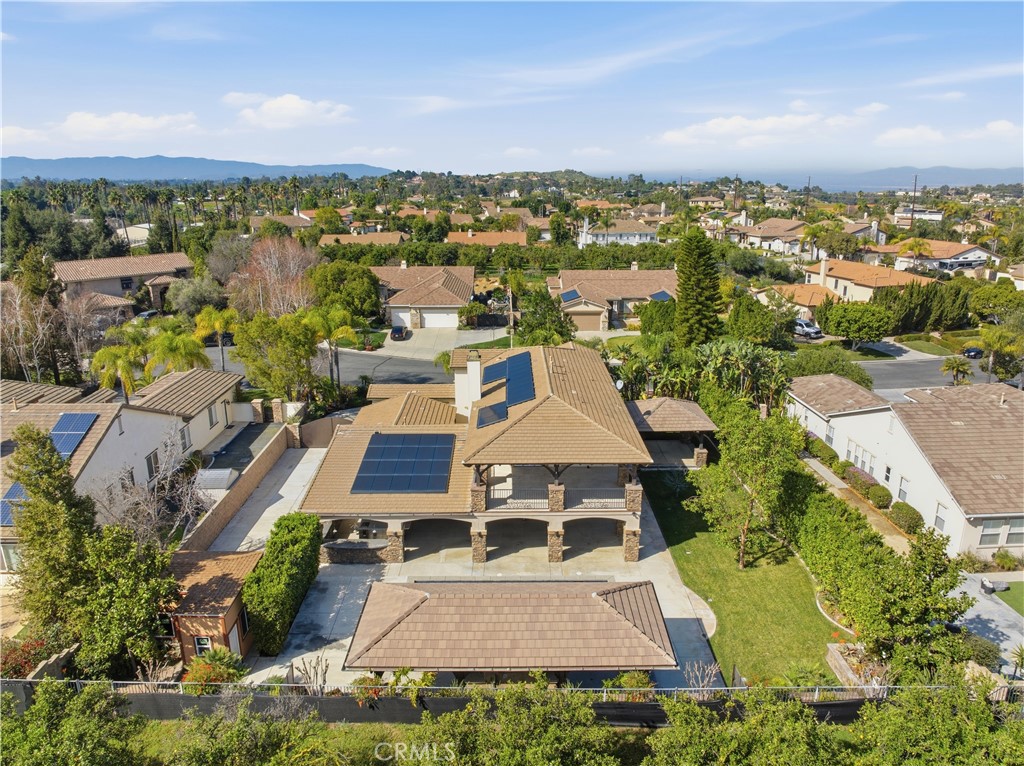 8075 Terraza Court Riverside, CA 92508 - Photo 74 of 75 an aerial view of a house with a garden