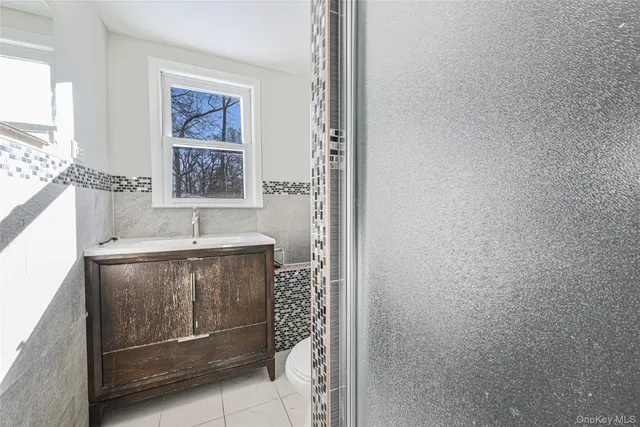 a utility room with a sink a washer and dryer