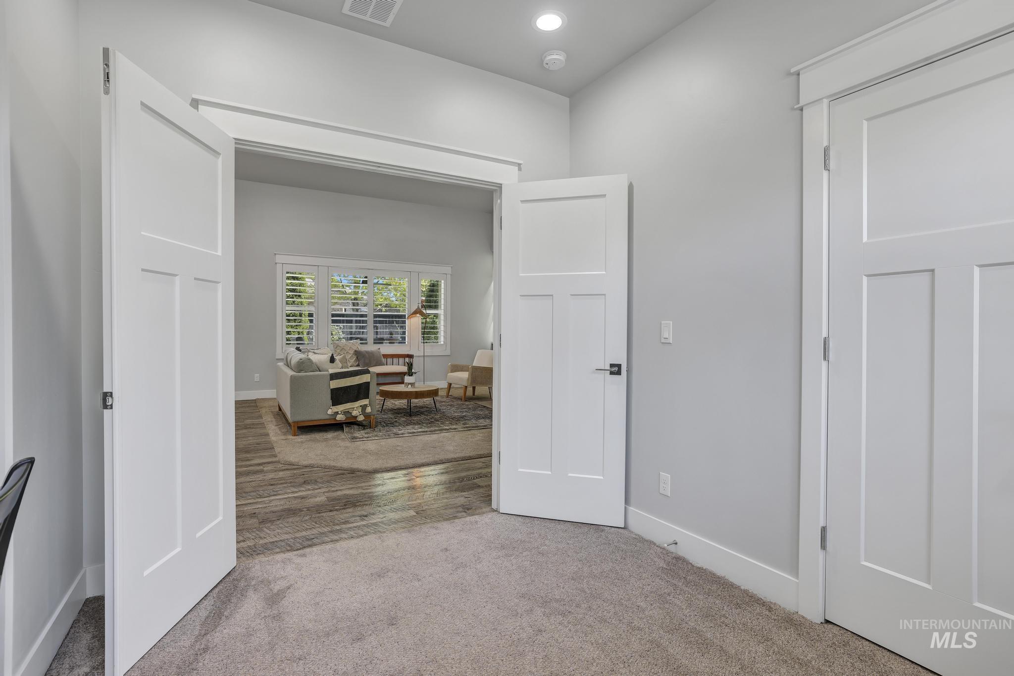 1937 Tamarack Loop Twin Falls, ID 83301 - Photo 22 of 50 Double shaker panel doors opening to a secondary room
