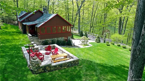a backyard of a house with seating space
