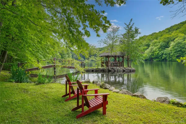 a view of a lake with a mountain in the background