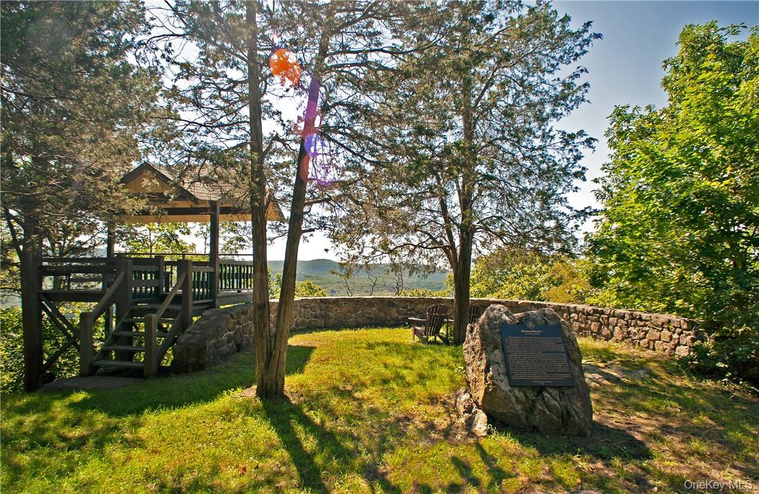 77 Lake Drive Cold Spring, NY 10516 - Photo 43 of 49 a view of swimming pool with table and chairs under an umbrella