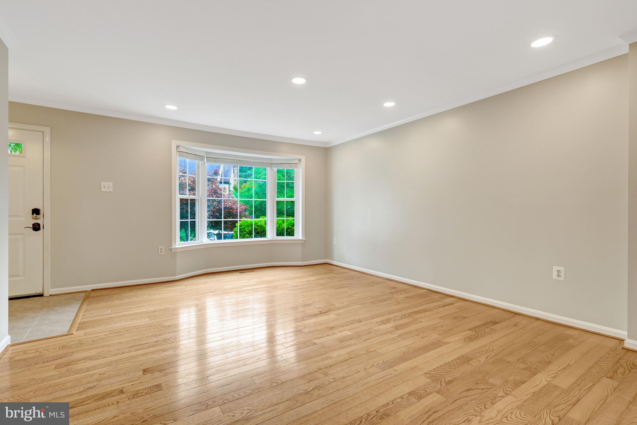 11992 Sentinel Point Court Reston, VA 20191 - Photo 7 of 49 Family room full of natural light