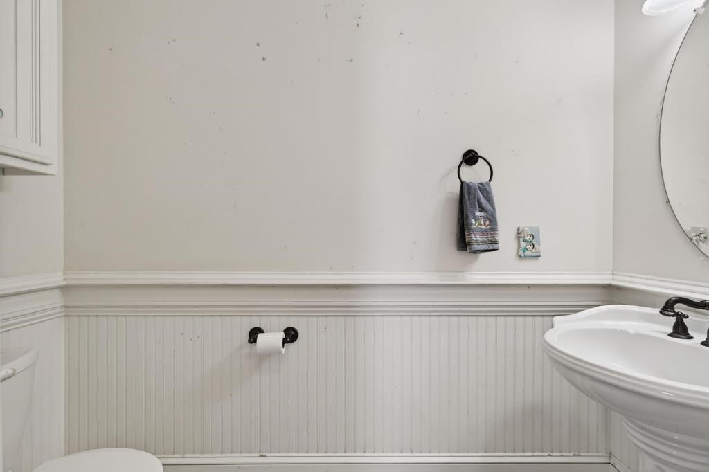 45107 Booth Street Callahan, FL 32011 - Photo 26 of 68 a bathroom with a sink and mirror