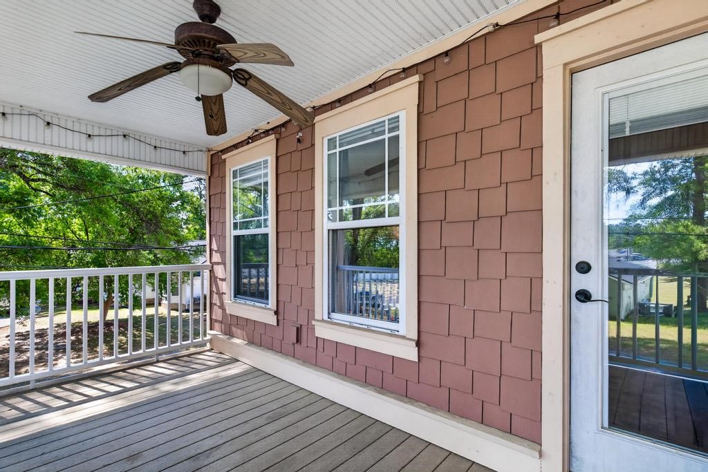 45107 Booth Street Callahan, FL 32011 - Photo 49 of 68 a view of a balcony with wooden floor
