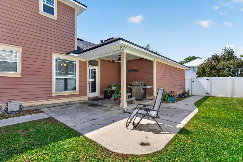 45107 Booth Street Callahan, FL 32011 - Photo 55 of 68 a view of a house with backyard