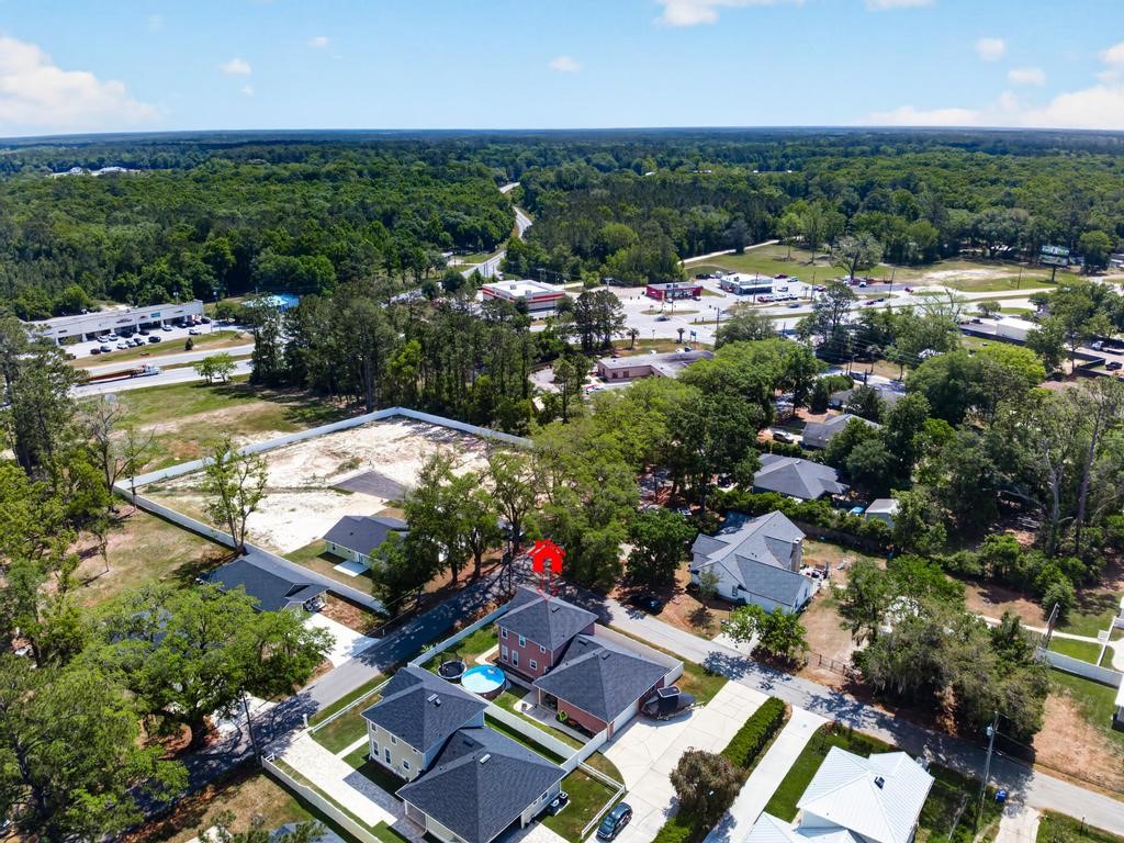 45107 Booth Street Callahan, FL 32011 - Photo 62 of 68 an aerial view of residential houses with outdoor space