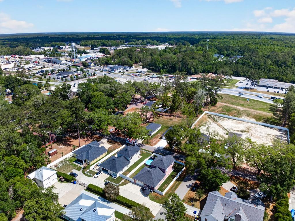 45107 Booth Street Callahan, FL 32011 - Photo 65 of 68 an aerial view of residential houses with outdoor space