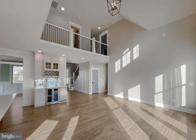 a bathroom with a sink a mirror and shower