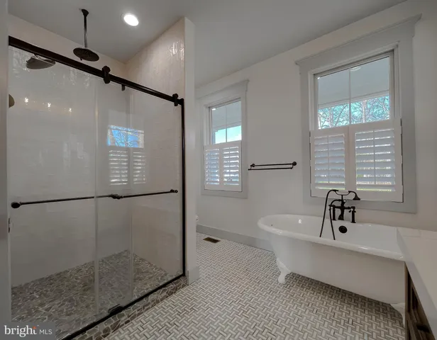 a view of empty room with windows