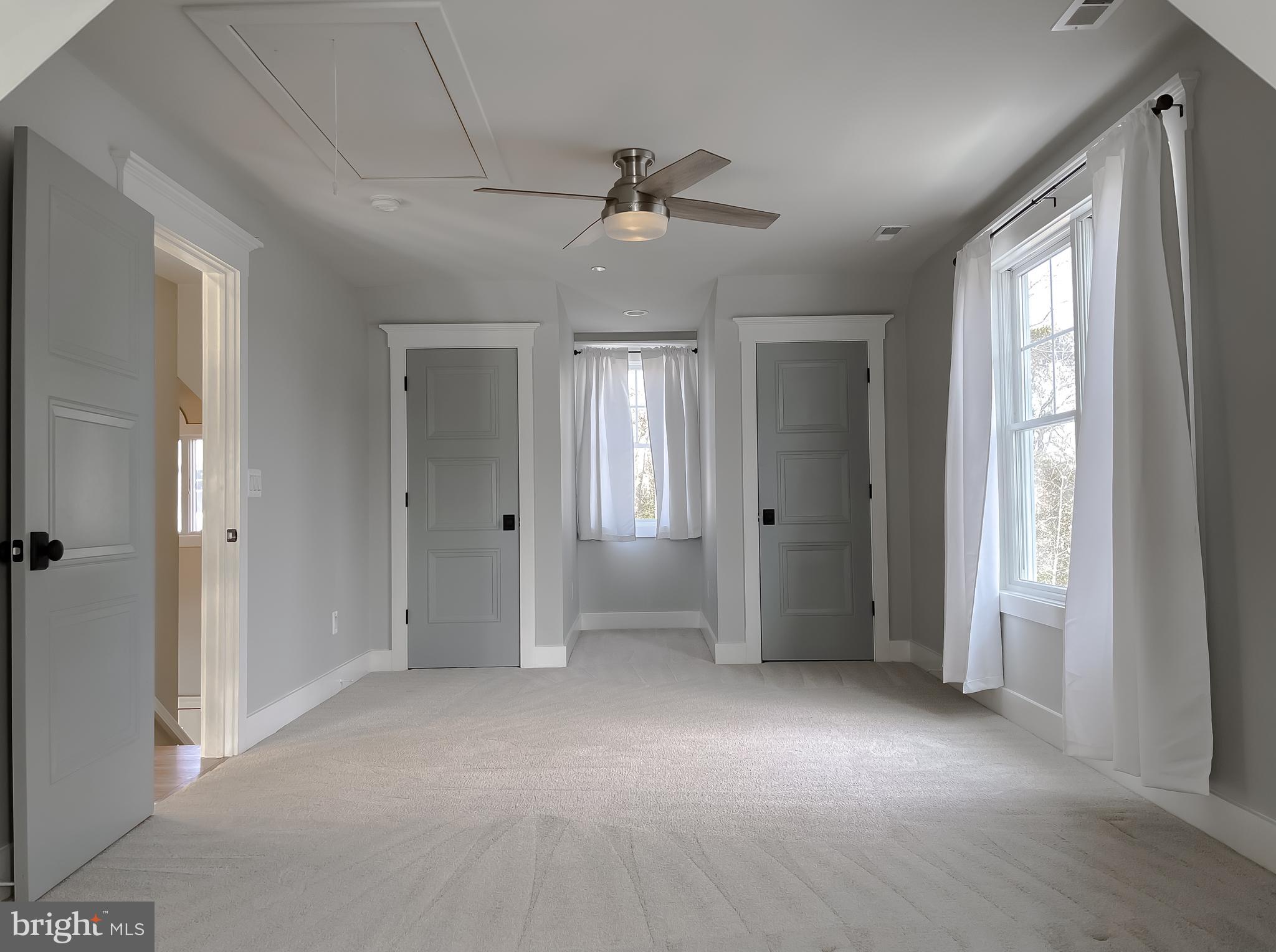 45093 Smiths Nursery Road Hollywood, MD 20636 - Photo 42 of 79 a view of empty room with a ceiling fan