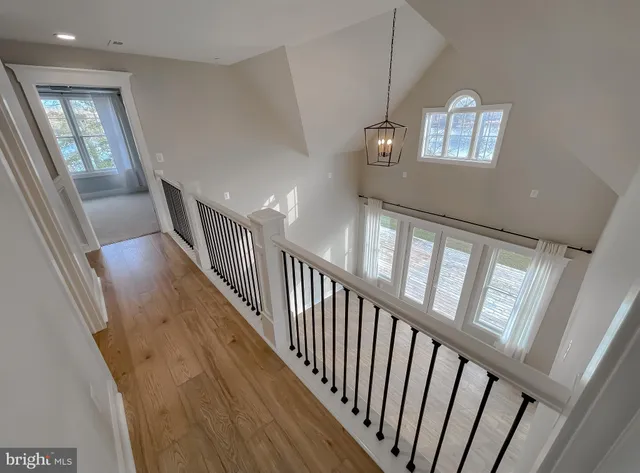 a view of a street with a building in the background