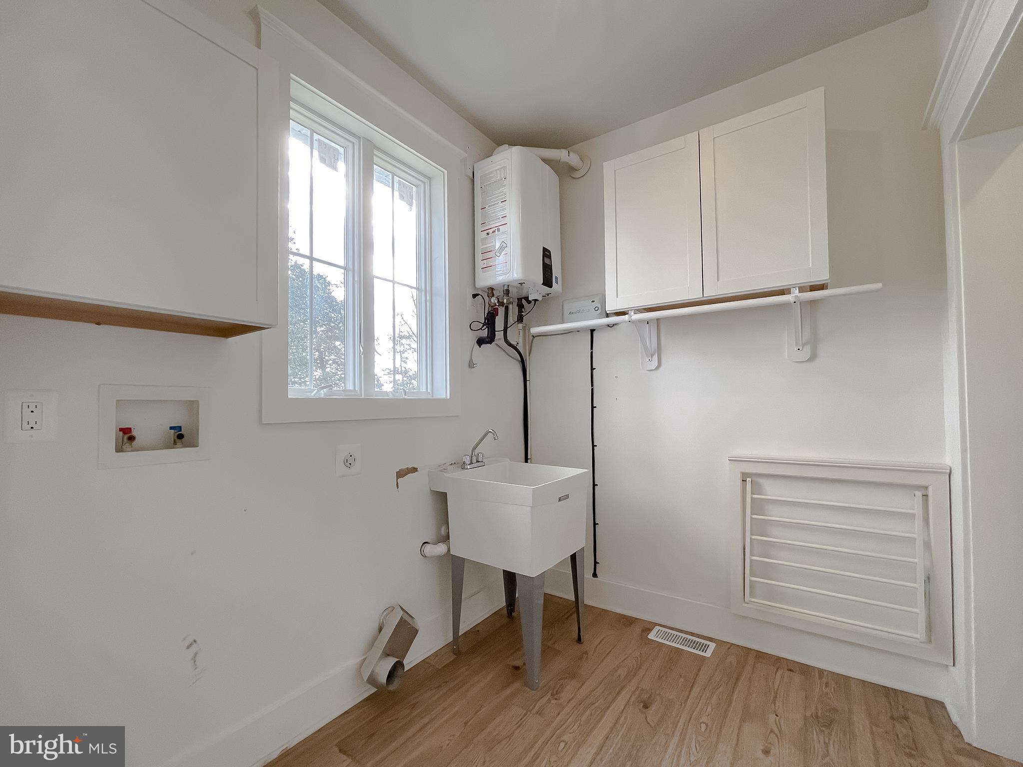 45093 Smiths Nursery Road Hollywood, MD 20636 - Photo 47 of 79 a room with a window and wooden floor