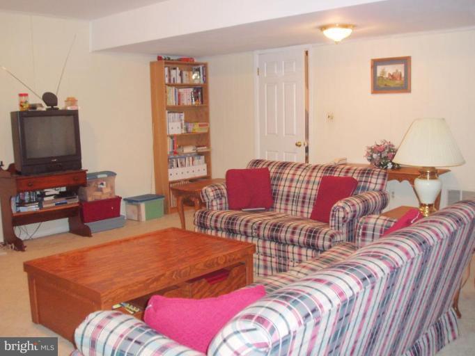 482 Colonial Ridge Lane, Unit 99 Arnold, MD 21012 - Photo 7 of 28 Large lower level Family Room
