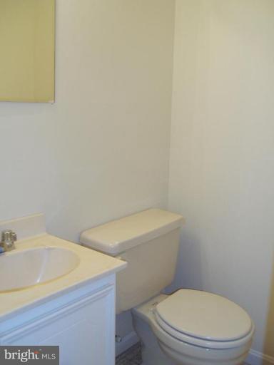 482 Colonial Ridge Lane, Unit 99 Arnold, MD 21012 - Photo 9 of 28 Lower Level Half Bath off Family Room!