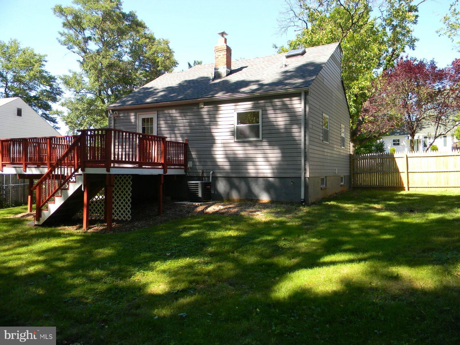 12308 Dewey Road Silver Spring, MD 20906 - Photo 5 of 25 a view of a house with a backyard