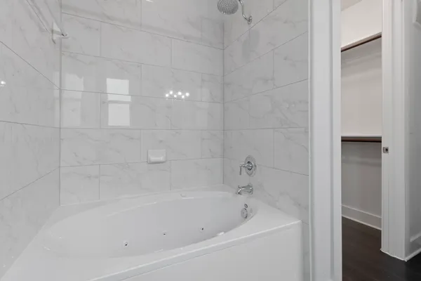 a close up of a bathtub in a bathroom