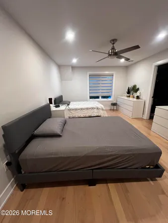 a bathroom with a shower and a sink