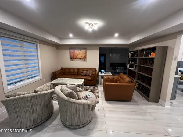 a kitchen with a sink stainless steel appliances a counter space and cabinets