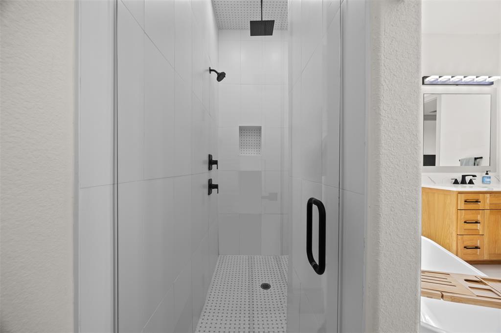 6317 Vega Road Godley, TX 76044 - Photo 15 of 27 a bathroom with a shower