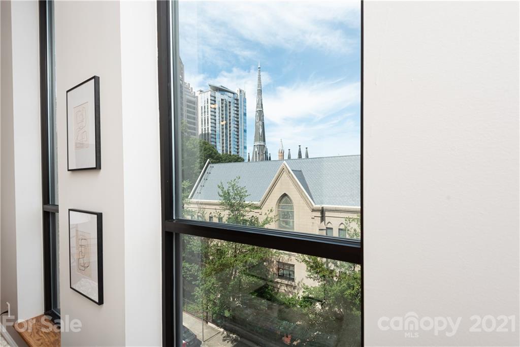 127 North Tryon Street, Unit 416 Charlotte, NC 28246 - Photo 13 of 24 a view of a floor to ceiling window