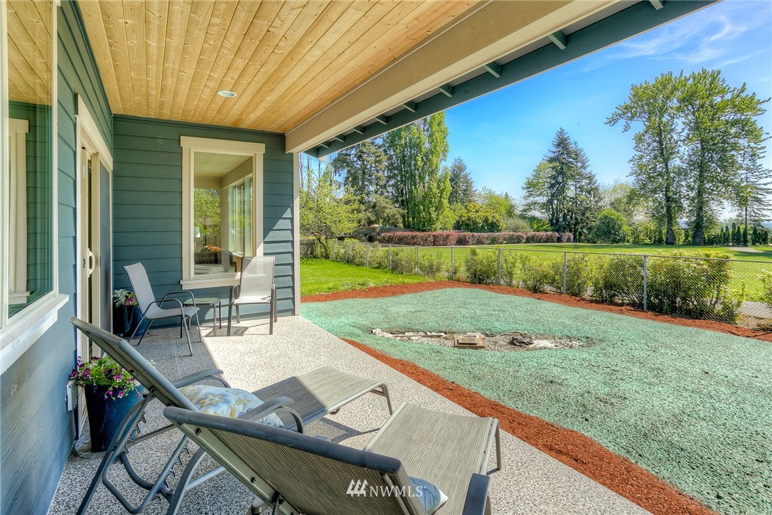 719 Southwest Langston Road Renton, WA 98057 - Photo 23 of 25 a view of yard from deck with patio