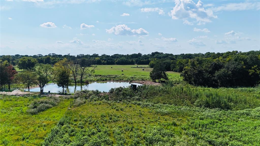 1129 Rd Chatfield Tx 75105 Road Chatfield, TX 75105 - Photo 4 of 7 a view of a lake with houses in the back