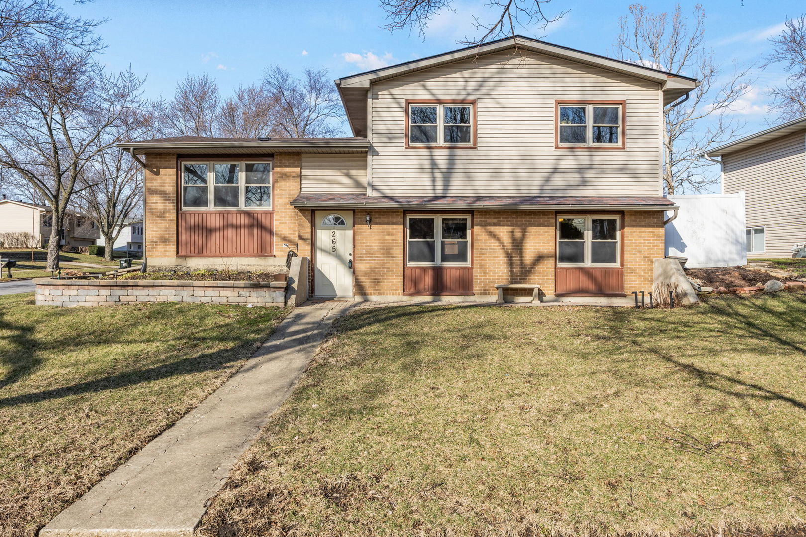 265 Cobb Circle Bolingbrook, IL 60440 - Photo 1 of 29 a front view of a house with a yard