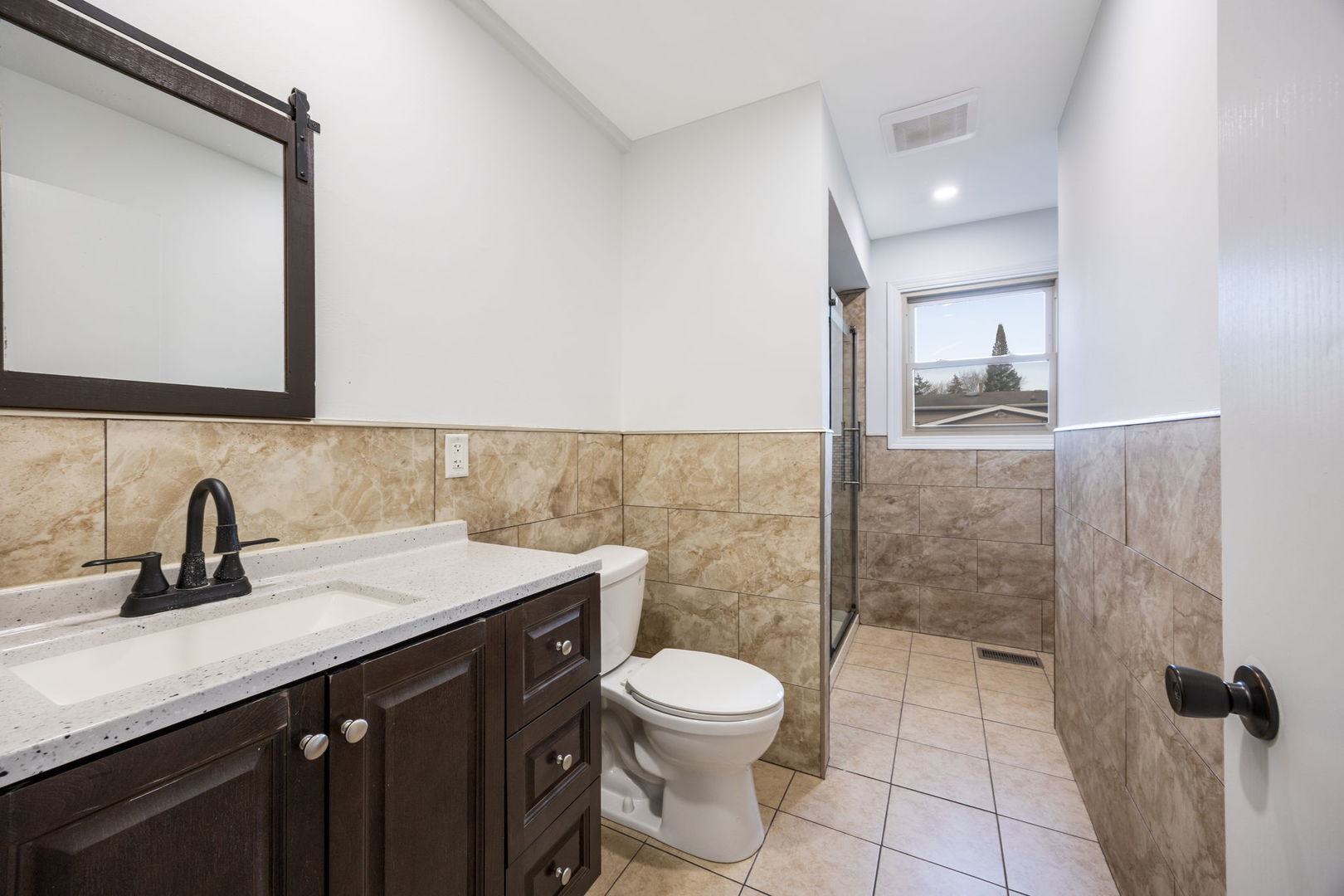 265 Cobb Circle Bolingbrook, IL 60440 - Photo 14 of 29 a bathroom with a sink a toilet and mirror
