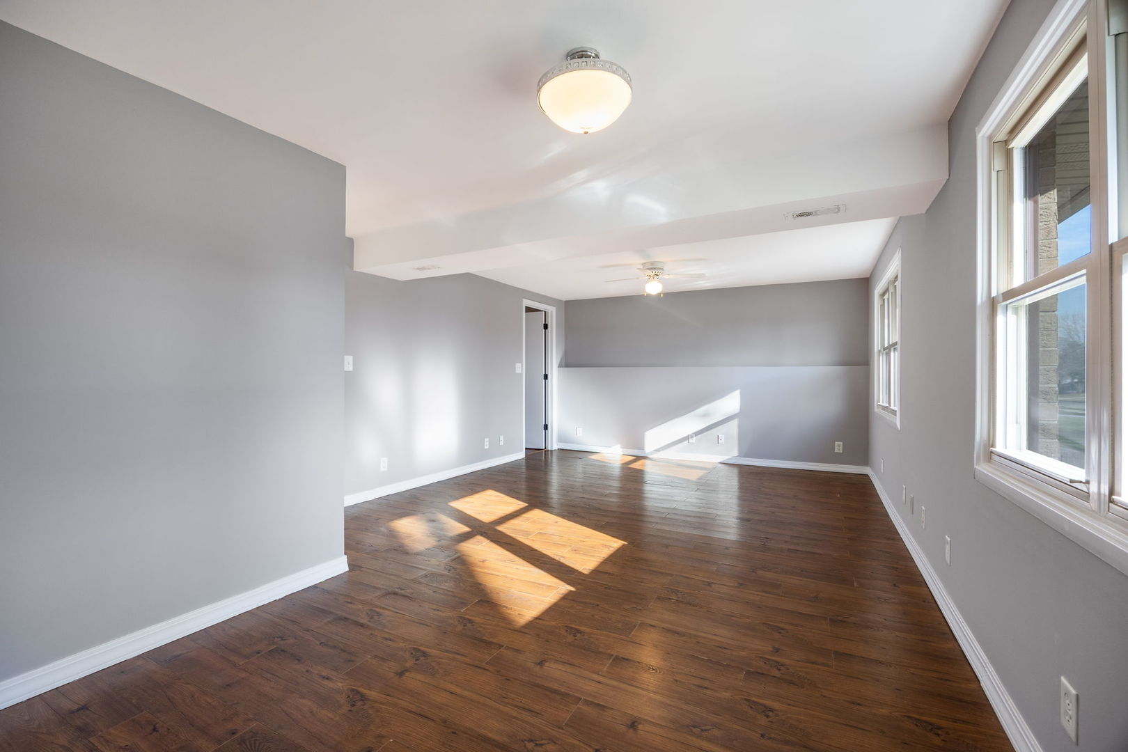 265 Cobb Circle Bolingbrook, IL 60440 - Photo 18 of 29 a view of empty room with wooden floor and fan