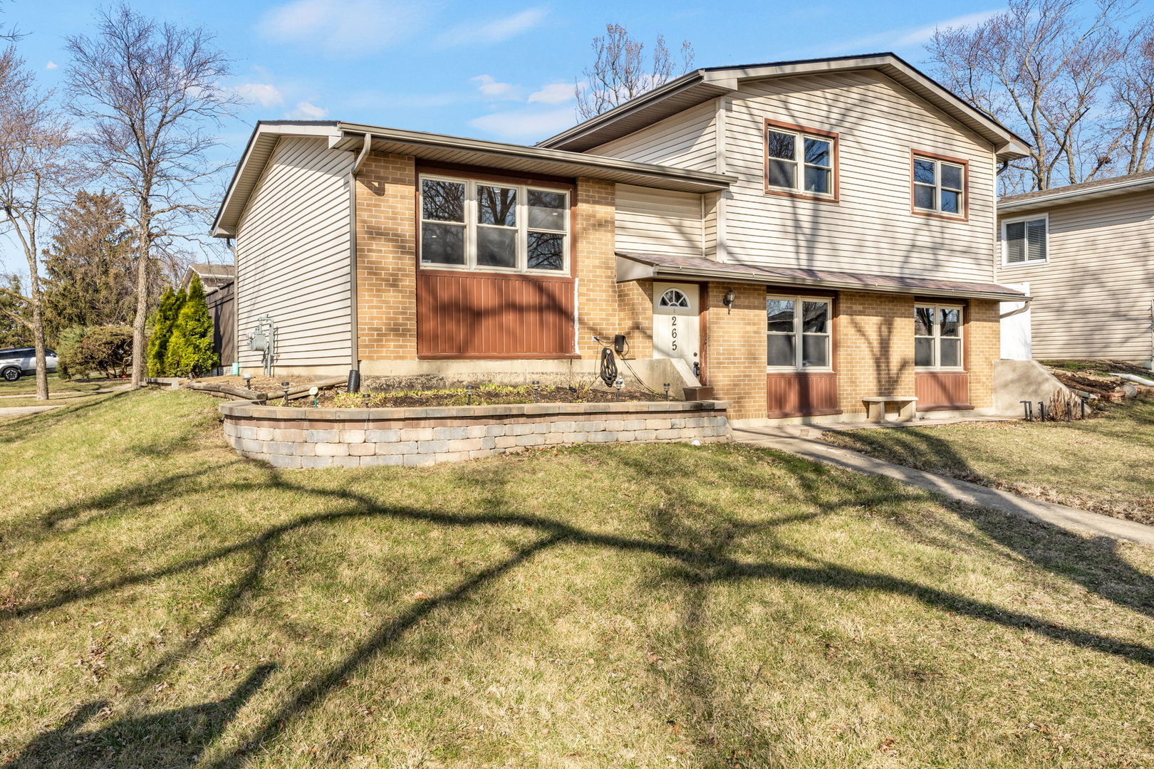 265 Cobb Circle Bolingbrook, IL 60440 - Photo 2 of 29 a front view of a house with a yard