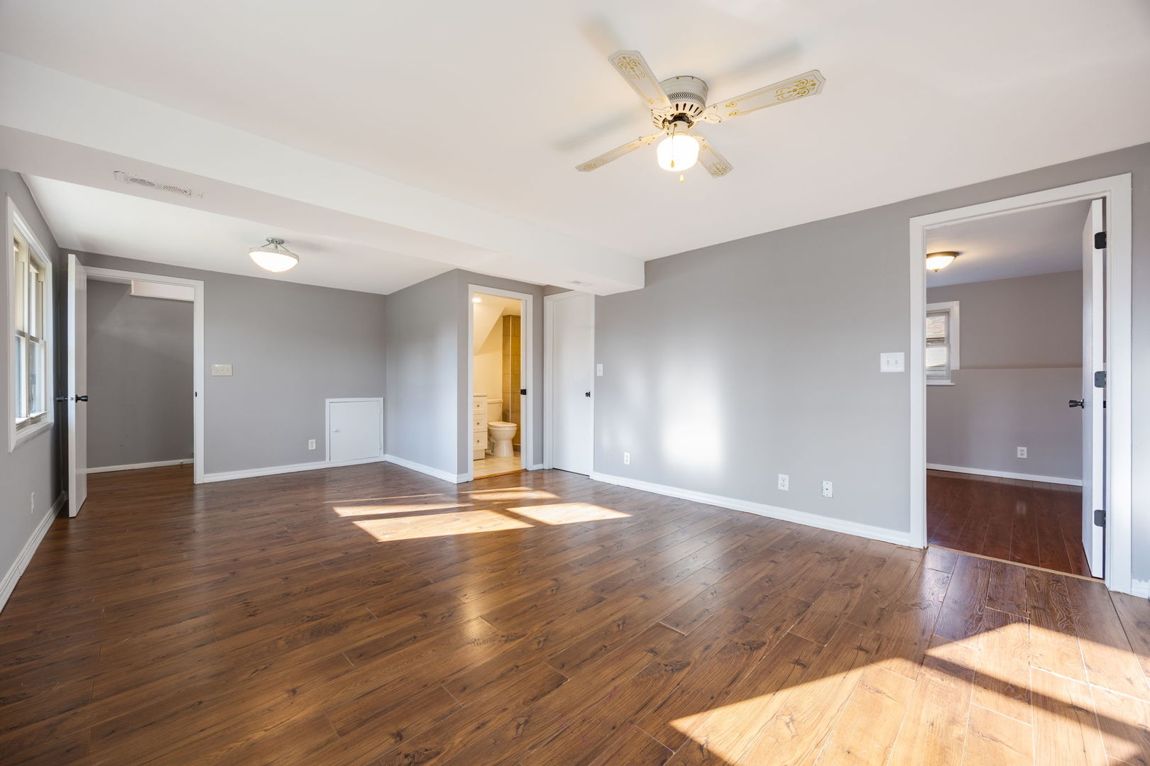 265 Cobb Circle Bolingbrook, IL 60440 - Photo 21 of 29 a view of an empty room with window and wooden floor