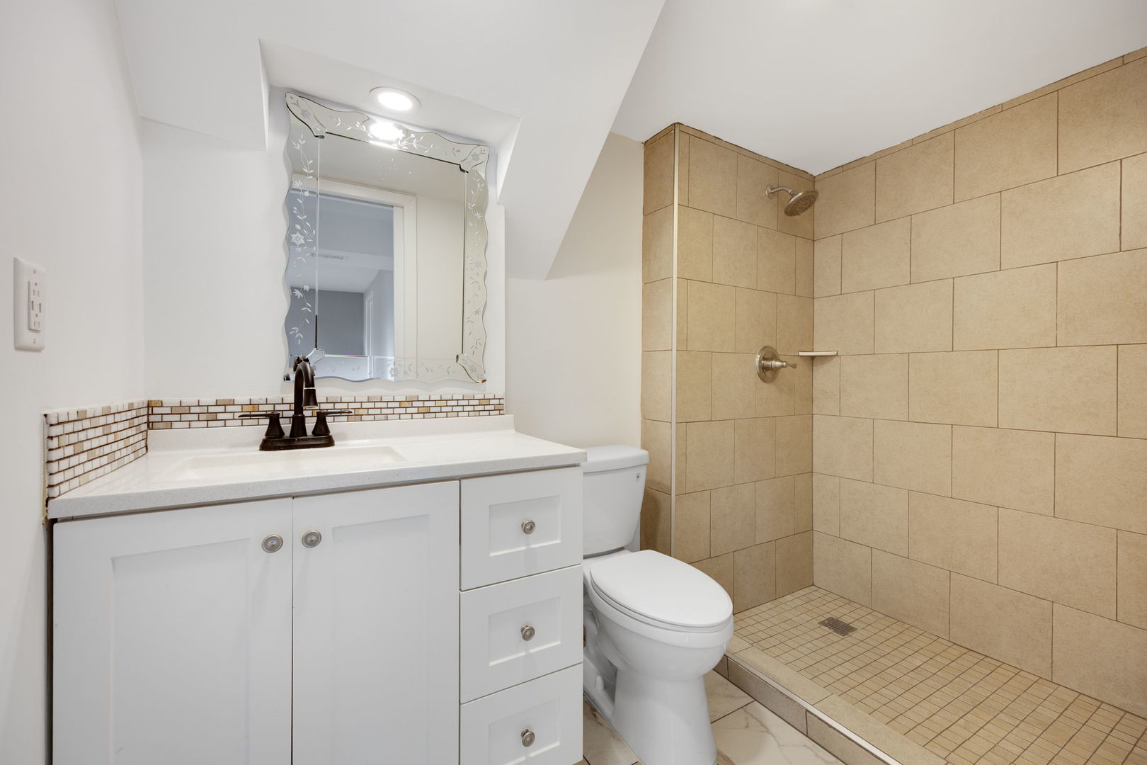 265 Cobb Circle Bolingbrook, IL 60440 - Photo 22 of 29 a bathroom with a sink a toilet and shower