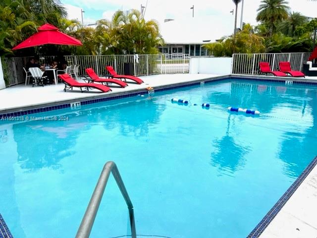 2101 Normandy Drive, Unit 204 Miami Beach, FL 33141 - Photo 5 of 30 a view of swimming pool with a yard